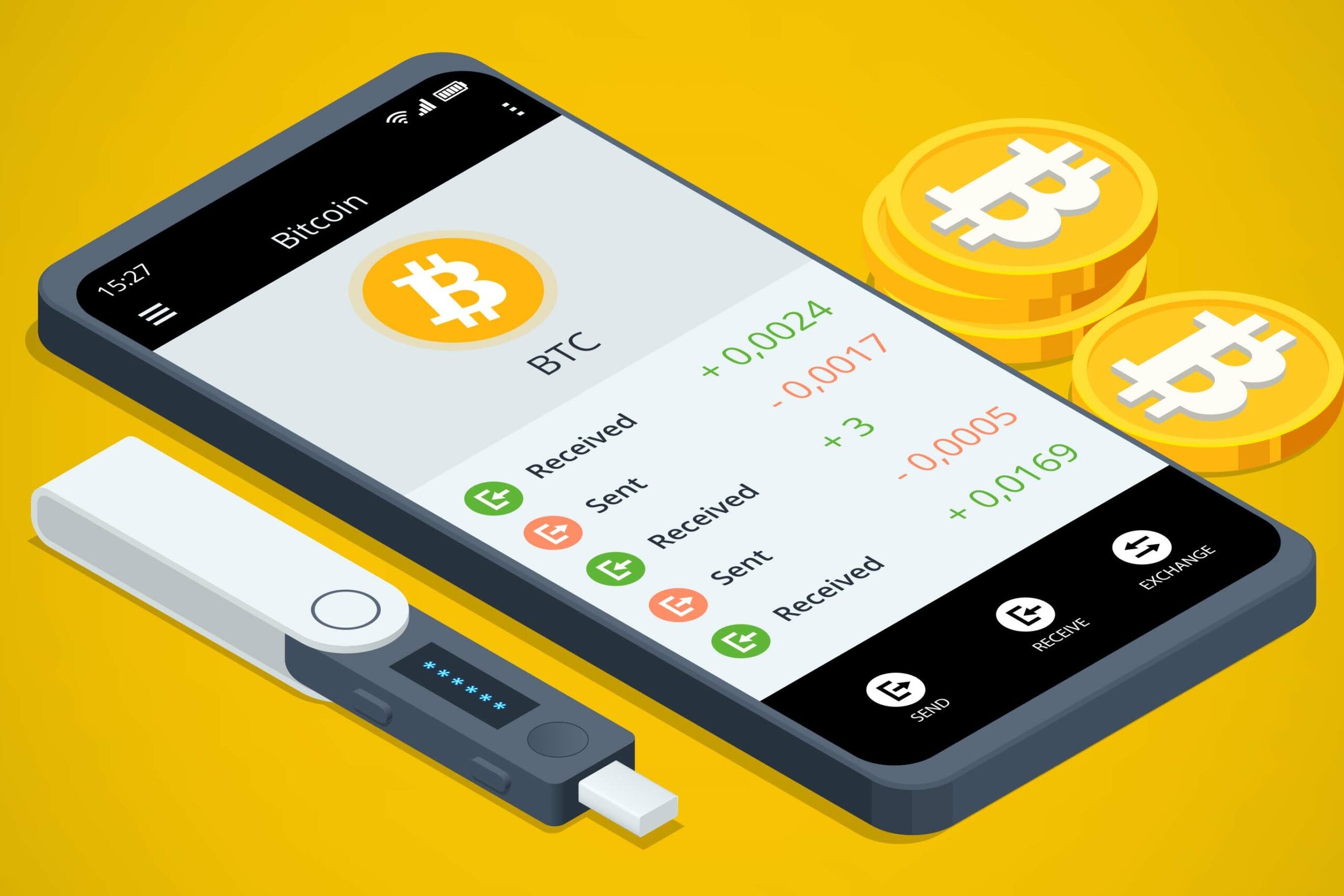 Smartphone displaying Bitcoin wallet app interface with transaction history, alongside a hardware wallet and Bitcoin coins on yellow background.